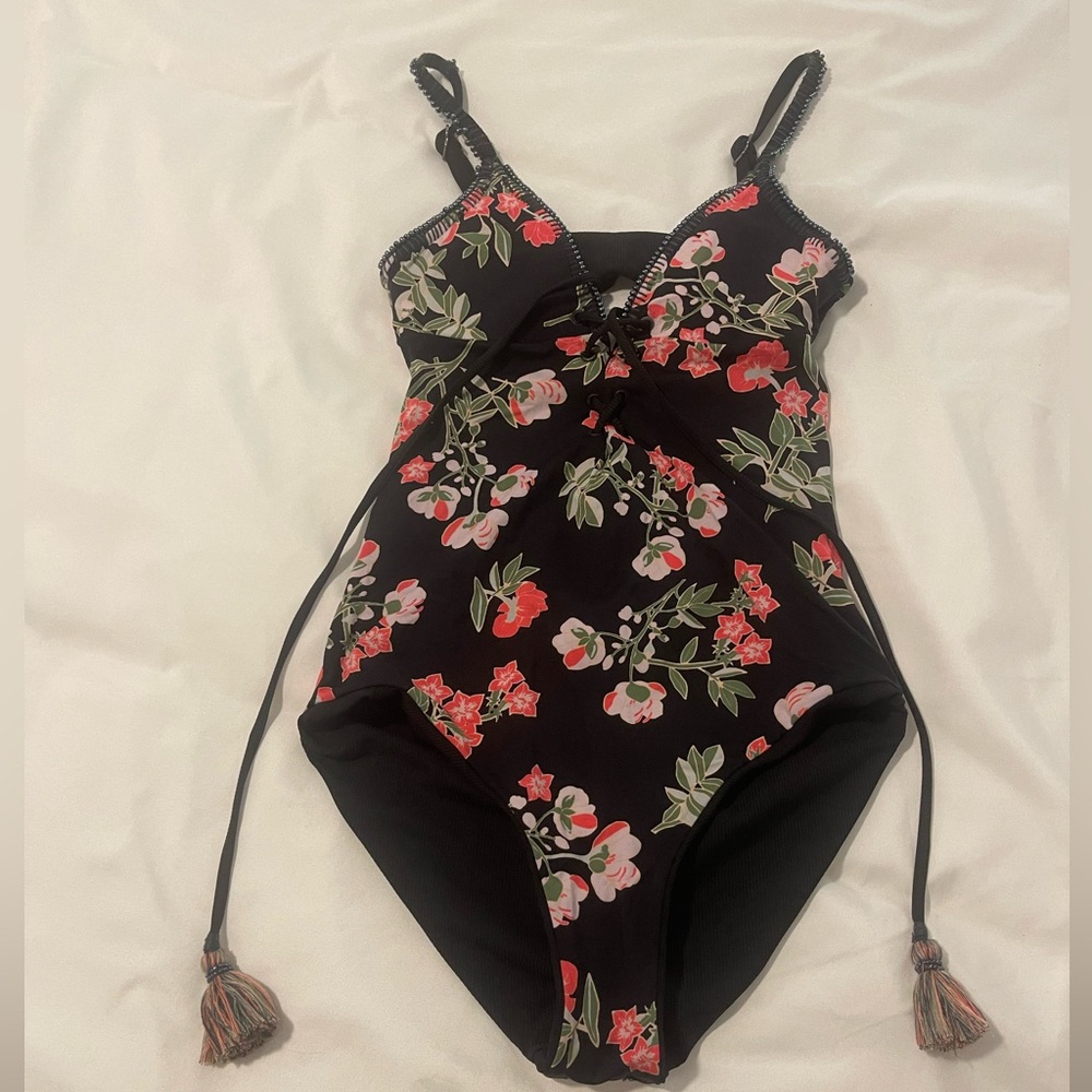 Reversible one piece - all black ribbed one side / black coral flower print.